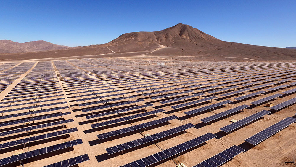 A field of solar panels in the desert